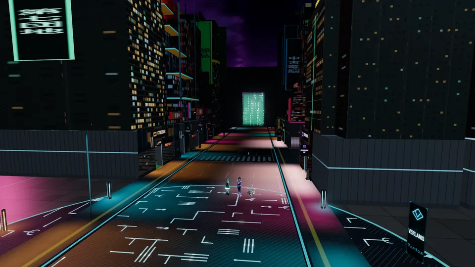 The high street from above: neon signs, towers and the lit gate at its end